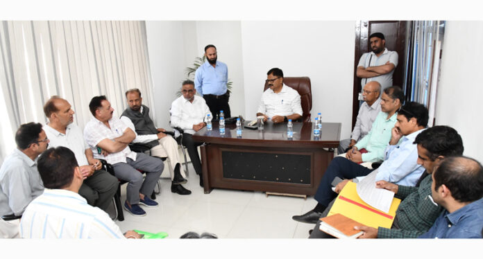 Minister Javed Rana meeting a delegation at Jammu on Wednesday.