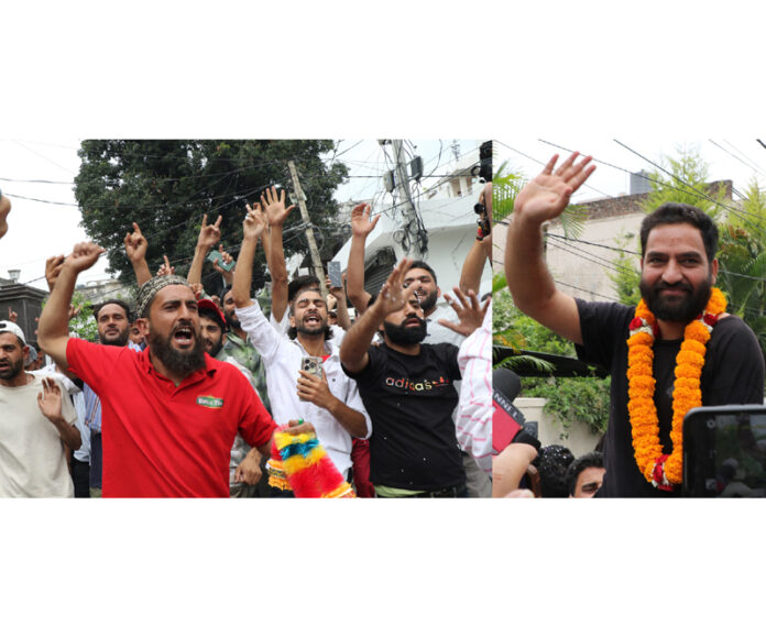 Supporters raising slogans in favour of MLA Mehraj Malik on his release from jail. —Excelsior/Rakesh