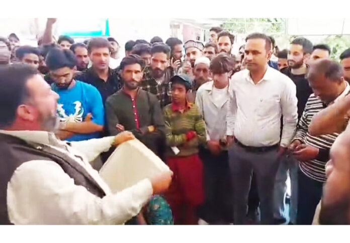 BJP leader, Mohammad Saleem Bhat and others during a protest at SDH Banihal on Tuesday.