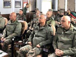 Lt Gen Pratik Sharma interacting with officers and troops in North Kashmir on Friday.