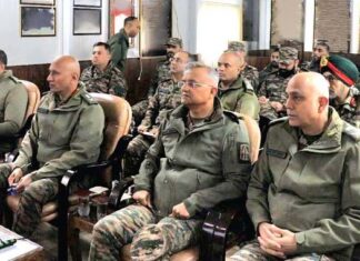 Lt Gen Pratik Sharma interacting with officers and troops in North Kashmir on Friday.