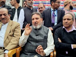 Apni Party president Altaf Bukhari speaking to media persons in Srinagar on Friday. -Excelsior/Shakeel