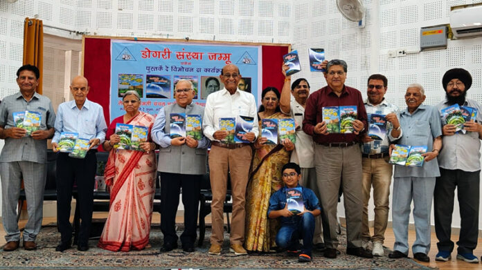Guests releasing Dogri books during a function by Dogri Sanstha Jammu on Sunday.