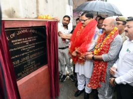 Minister Javed Rana laying foundation for Tawi embankment works on Friday.
