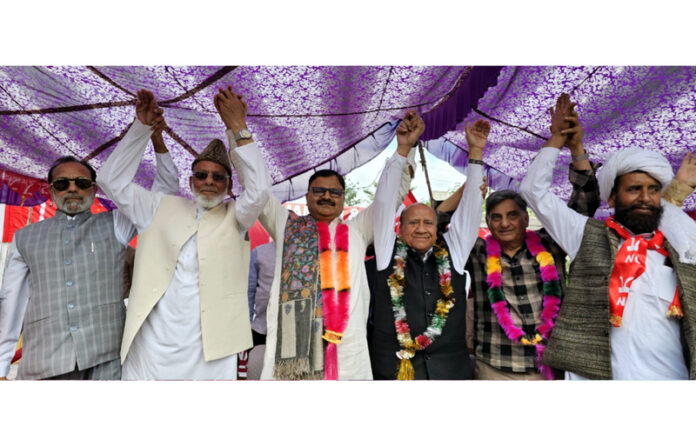 Senior NC leader and Minister for Jal Shakti, Forests and Tribal Affairs, Javed Rana and others during workers’ meeting in Bhaderwah.