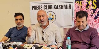 Members of All Kashmir Hot Mix Plant Owners Association during a press conference in Srinagar on Monday. -Excelsior/Shakeel