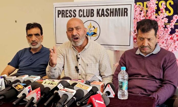 Members of All Kashmir Hot Mix Plant Owners Association during a press conference in Srinagar on Monday. -Excelsior/Shakeel