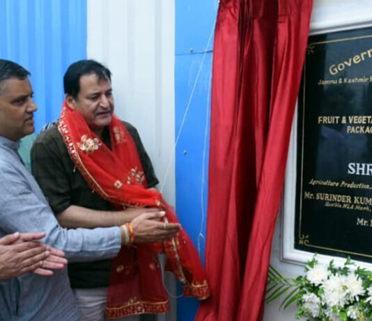 Minister Javid Dar inaugurating a processing unit in Marh on Wednesday.