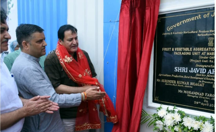 Minister Javid Dar inaugurating a processing unit in Marh on Wednesday.