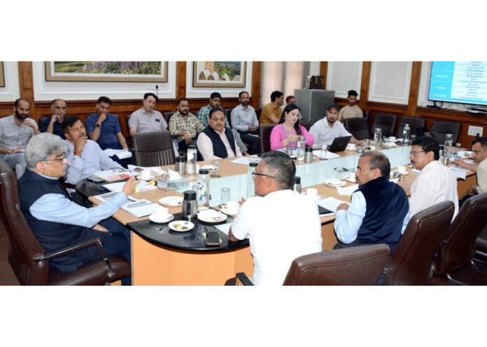 Chief Secretary chairing a meeting at Jammu on Thursday.