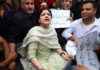 PDP leader Iltija Mufti alongwith party workers staging protest outside the PDP headquarters in Srinagar on Tuesday. —Excelsior/Shakeel