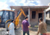 Unauthorised structure being demolished by JDA on Thursday.