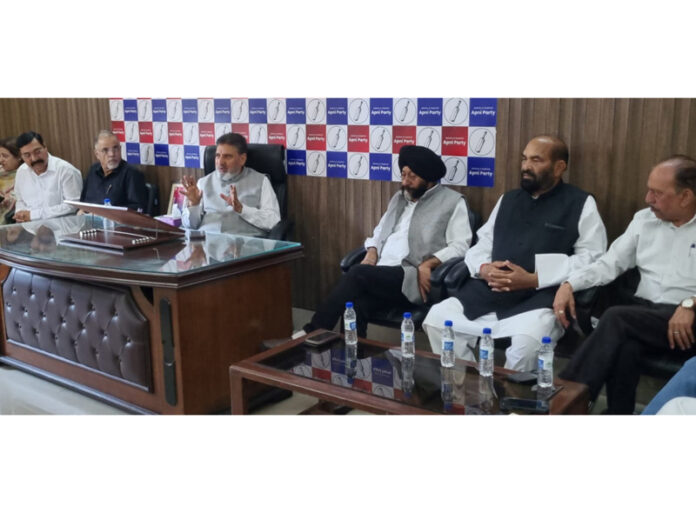 Apni Party president, Altaf Bukhari chairing a meeting in Jammu on Monday. Apni Party president, Altaf Bukhari chairing a meeting in Jammu on Monday.