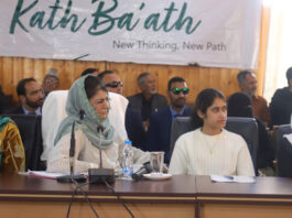 Mehbooba Mufti interacting with local residents and party workers during outreach progamme “Kaath Baat” at Baramulla on Thursday.