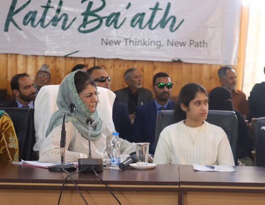 Mehbooba Mufti interacting with local residents and party workers during outreach progamme “Kaath Baat” at Baramulla on Thursday.