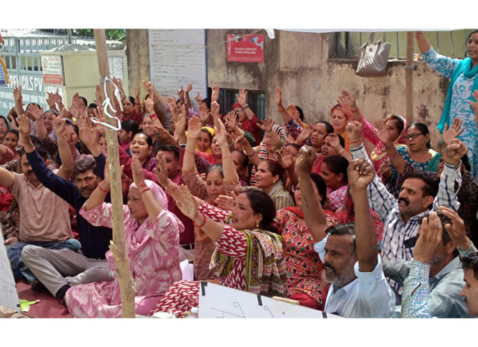 Pencil factory workers staging protest dharna in Jammu.