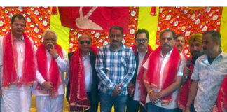 Ajay Sadhotra, additional General Secretary JKNC posing along with others during a function at Jammu.