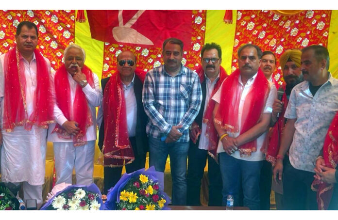 Ajay Sadhotra, additional General Secretary JKNC posing along with others during a function at Jammu. Ajay Sadhotra, additional General Secretary JKNC posing along with others during a function at Jammu.