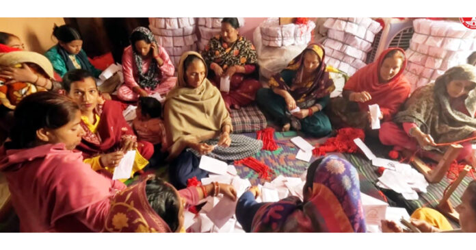 Members of a Self-Help Group preparing Prasad item for Shrine Board.