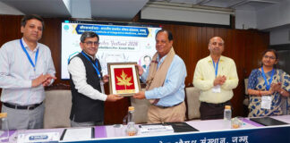 Dr Zabeer Ahmed, Director CSIR, IIIM felicitating Dr Shakti Vinay Shukla in Jammu on Thursday.