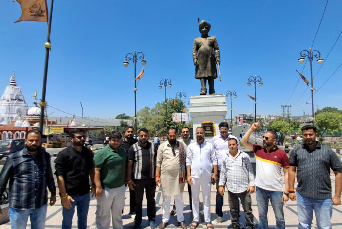 YRS members assemble at the statue of Maharaja Hari Singh near main Tawi bridge in Jammu.