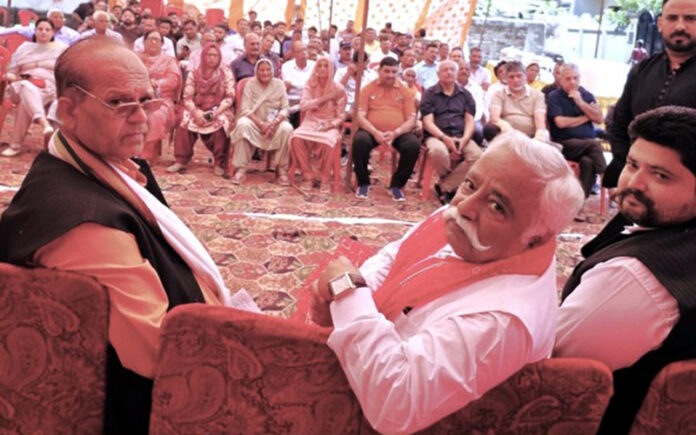 Additional general secretary of National Conference and former minister, Ajay Sadhotra, flanked by others, during public meeting at Barnai in Jammu North on Sunday. Additional general secretary of National Conference and former minister, Ajay Sadhotra, flanked by others, during public meeting at Barnai in Jammu North on Sunday.