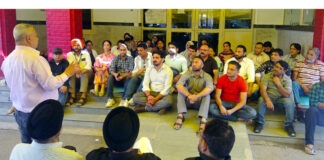 JKMEF chairman Sushil Sudan addressing protesting employees at SMGS Hospital, Jammu on Sunday.