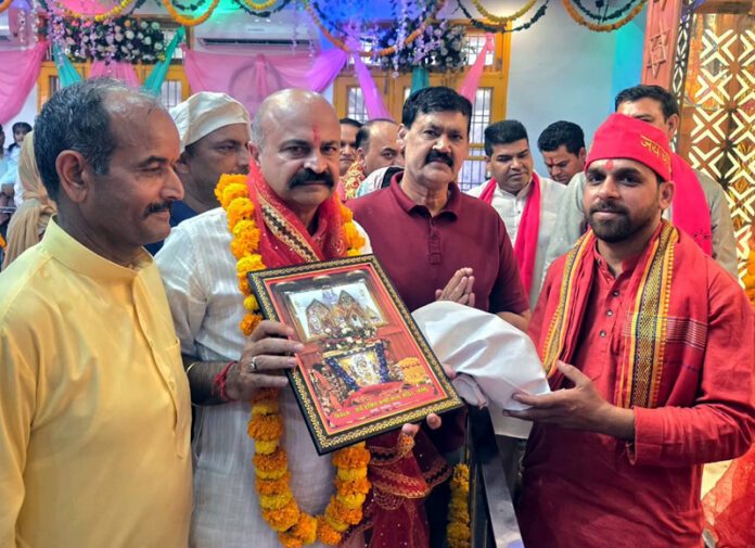 MLA Jammu East, Yudhvir Sethi during the annual celebrations of Shri Chandi Mata Ji at Dhammi, Nagrota on Sunday.