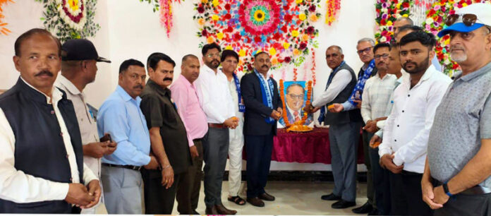 JKUT president of BSP, Darshan Rana and other leaders paying tribute to Dr Ambedkar during party meeting at Akhnoor on Sunday. JKUT president of BSP, Darshan Rana and other leaders paying tribute to Dr Ambedkar during party meeting at Akhnoor on Sunday.