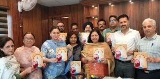 DHS Jammu Dr Abdul Hamid Zargar along with others launching a comprehensive book on mental health.