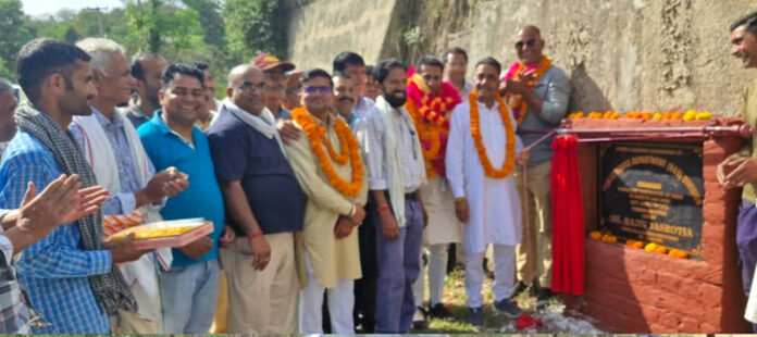 MLA Jasrota, Rajiv Jasrotia inaugurating rural road project in Dinga Amb on Saturday.