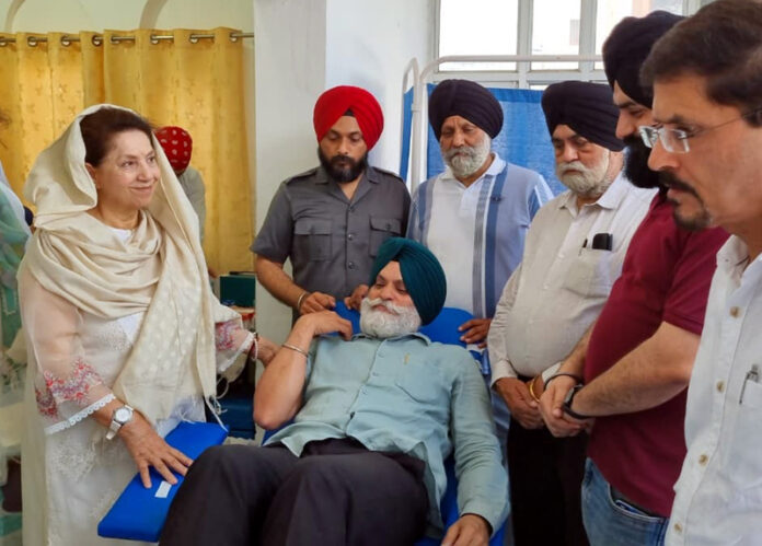 A volunteer donating blood during a camp at Gurudwara Guru Singh Sabha, Guru Nanak Nagar, Jammu.