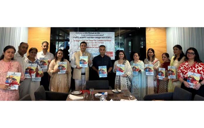 MD Mission Vatsalya Nazim Zai Khan and other dignitaries unveiling manual for community-based child protection in J&K.
