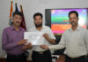 Deputy Director, SKPA Udhampur, Rajesh Sharma, presenting certificate to a participant of CCTNS course.