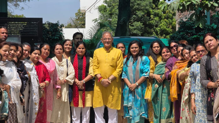 J&K BJP Mahila Morcha team posing for a group photograph with HP Governor Kavinder Gupta in Jammu on Thursday.