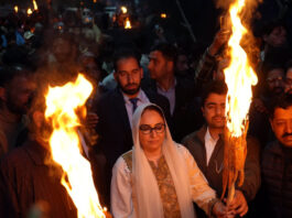 Chairperson of the J&K Waqf Board, Dr Syed Darakhshan Andrabi, paying obeisance at Aishmuqam shrine in Pahalgam.