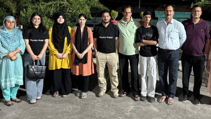 Toppers with PhysicsWallah team.