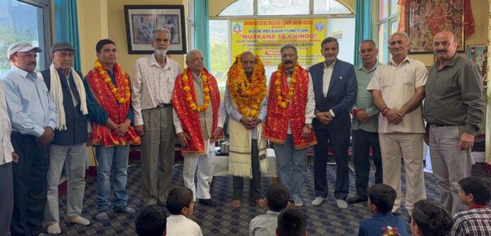 Dignitaries posing for a group photograph during a book release function in Katra on Sunday.