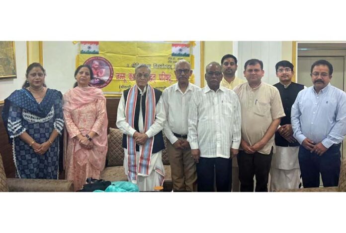 Dignitaries from Jammu and Kashmir Shri Kashi Vidvat Parishad posing for a group photograph in Jammu on Monday.