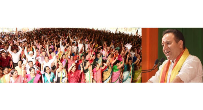 Sunil Sharma addressing a public gathering in Lakhipur area of Assam on Thursday.