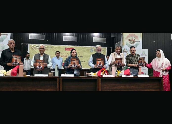 Minister Sakeena Itoo and others releasing Urdu magazine during a seminar at JU on Thursday.