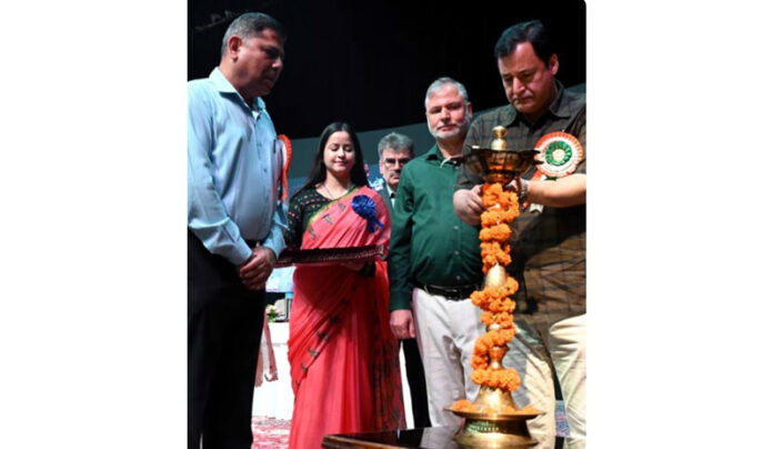 Minister Javid Dar inaugurating conference on Monday.