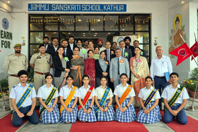 Prominent dignitaries posing with students during inauguration of Legal Literacy Club at Jammu Sanskriti School, Kathua.