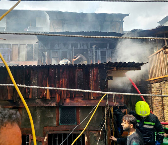 View of a house damaged in a fire in Habba Kadal area of Srinagar on Tuesday. -Excelsior/Shakeel