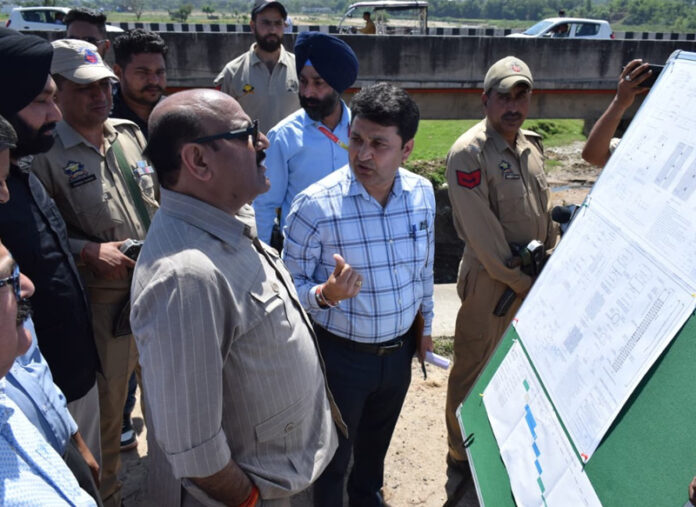 Deputy CM inspecting work on bridge project at Miran Sahib on Monday. Deputy CM inspecting work on bridge project at Miran Sahib on Monday.