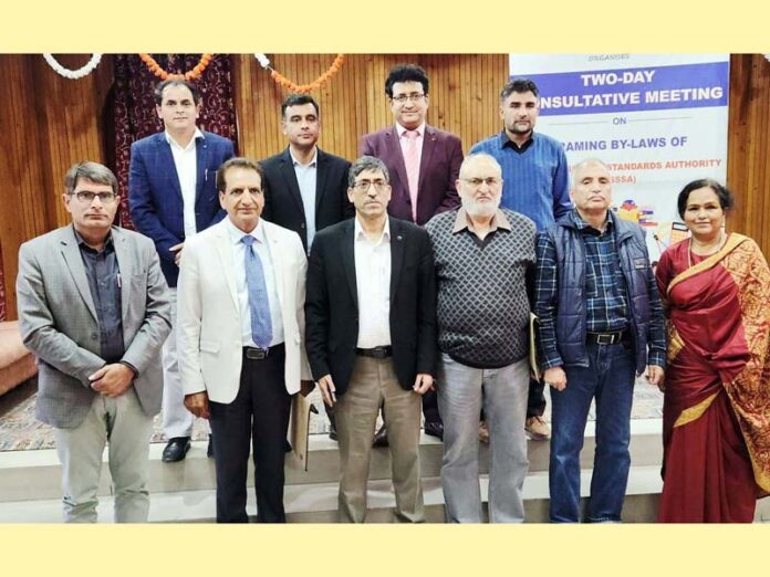 Stakeholders, experts and representatives from NIEPA posing for a group photograph during a two day meeting in Srinagar.