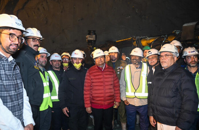 LG Ladakh Vinai Kumar Saxena with officials during inspection of Zoji-La Tunnel's eastern portal in Drass.