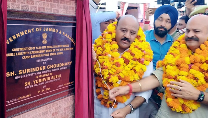 Deputy Chief Minister inaugurating bridge at Bus Stand, Jammu on Saturday. Deputy Chief Minister inaugurating bridge at Bus Stand, Jammu on Saturday.