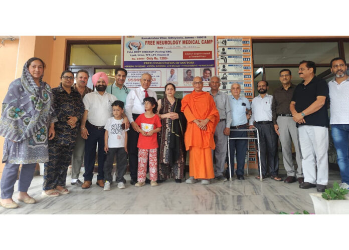 Doctors posing with officials of Ramakrishna Mission during a medical camp at Mission’s Hospital, Jammu on Friday.