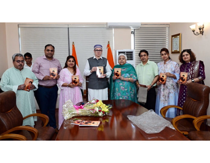 CM Omar Abdhullah releasing biography 'Mitti se Mukam Tak' during a function in Jammu.